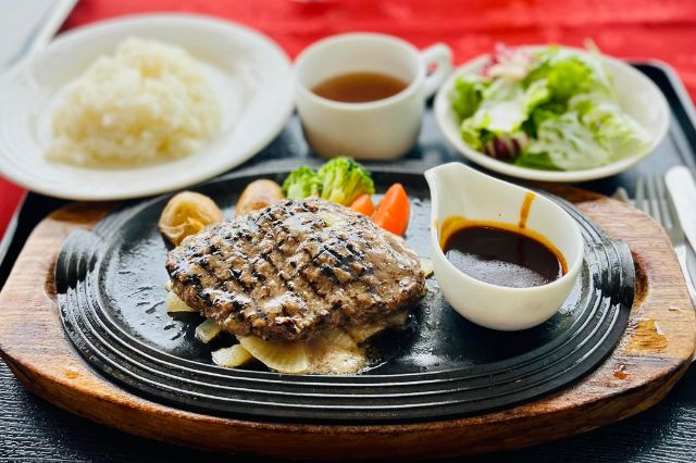 Hamburg steak lunch set with rice, salad and soup at a Japanese golf club restaurant