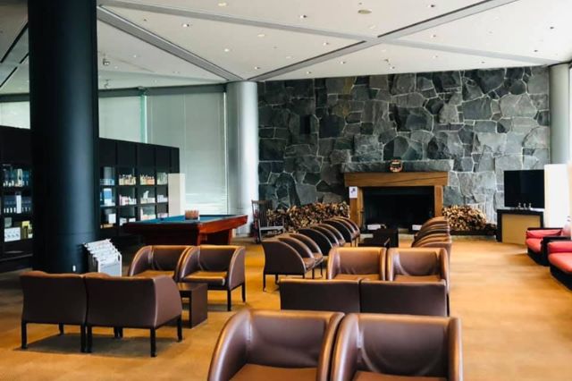 Modern lounge seating area inside a Japanese golf clubhouse