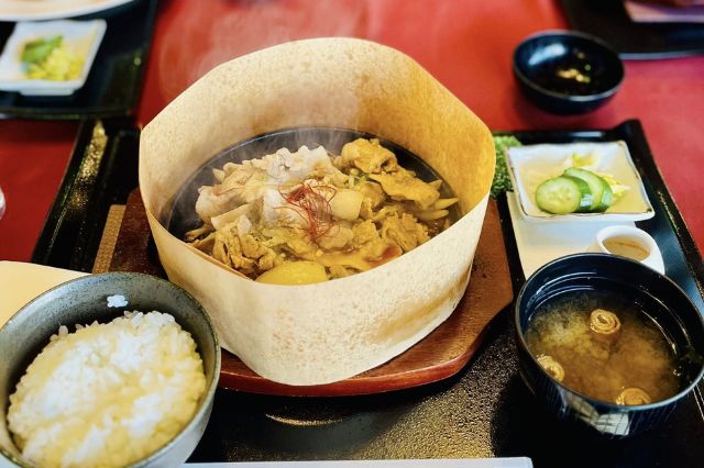 Japanese golf course lunch set with simmered pork hot pot, rice and miso soup